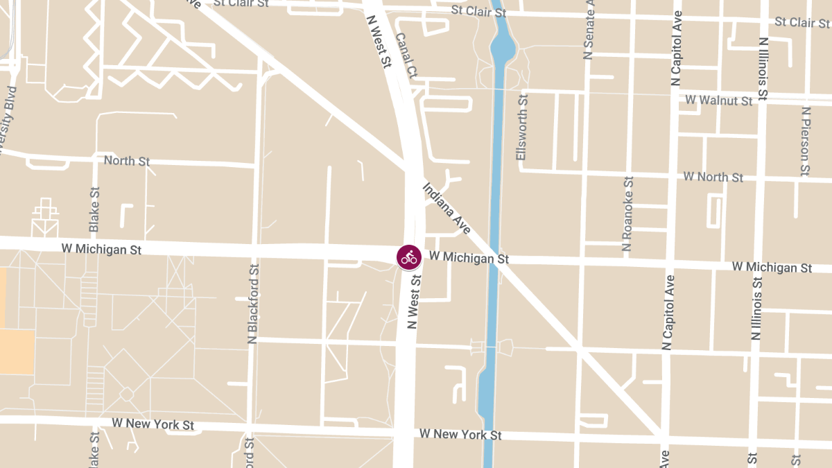 Bicyclist Struck and Injured by Truck at N West St & W Michigan St