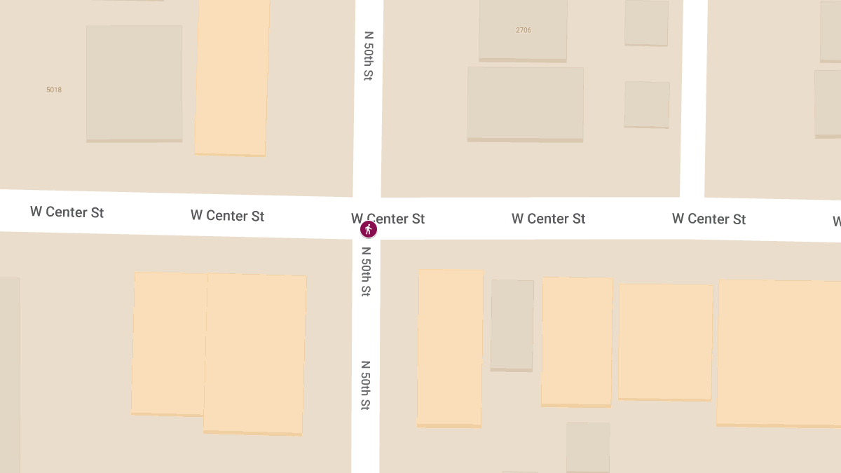 Pedestrian Struck and injured by Vehicle at 50/Center Intersection