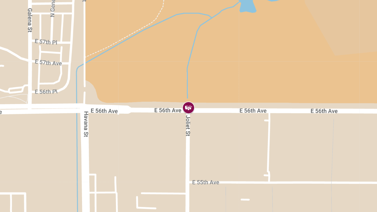 Traffic Crash at E 56th Ave and Joliet St causes Injuries