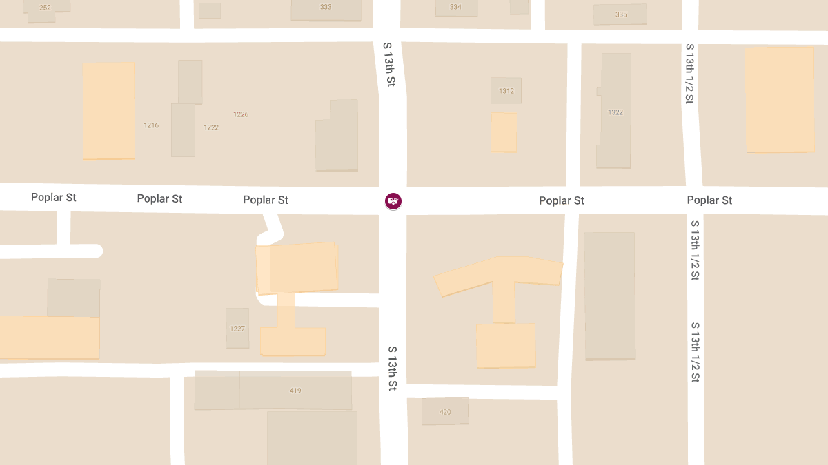 Motor Vehicle Accident with Injuries at 13th St and Poplar St
