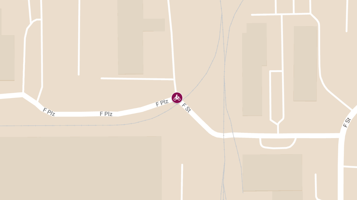 Motorcycle Crash With Injuries at F Plaza and F St