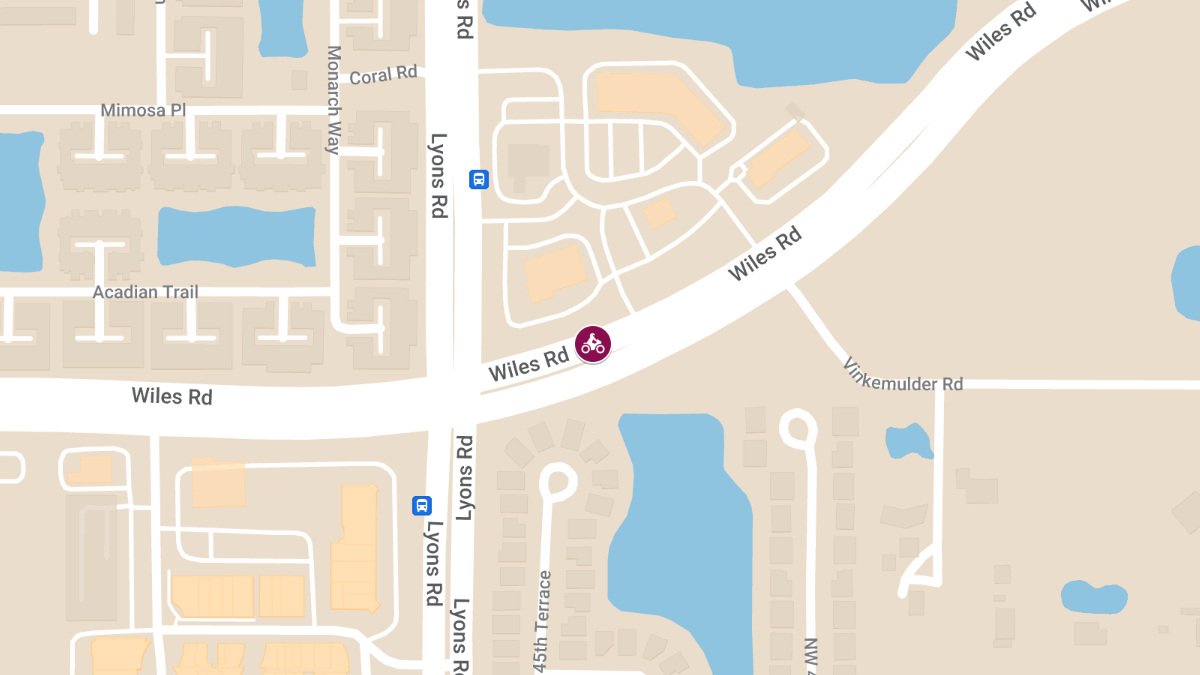 Motorcyclist Injured in Crash on Wiles Rd Near Lyons Rd and Banks Rd