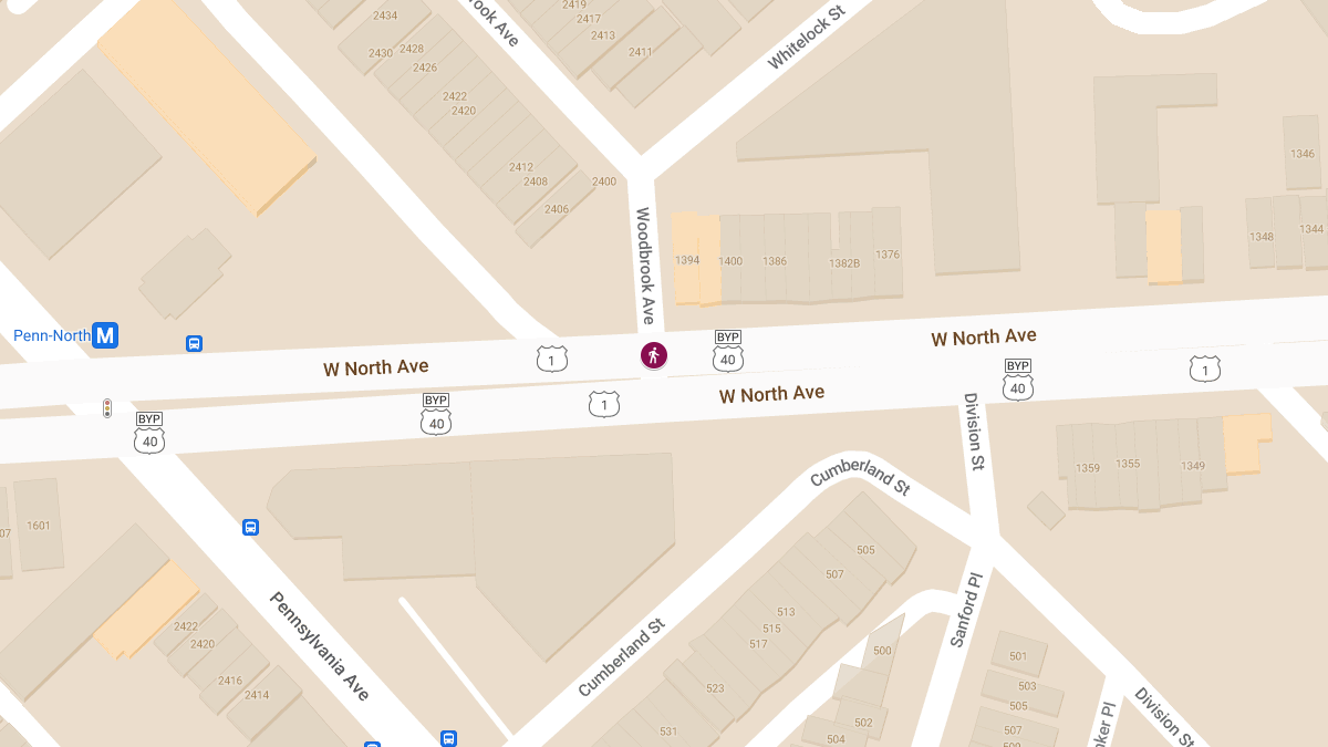 Police Vehicle Hits Pedestrian at Woodbrook Ave & W North Ave