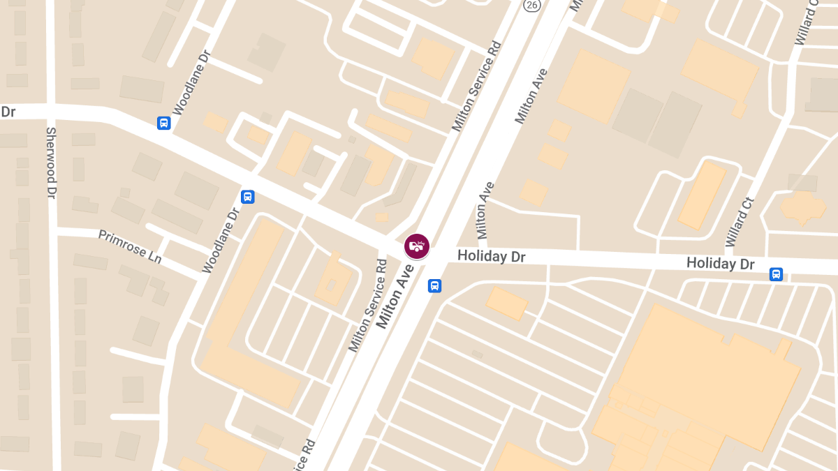 Traffic Accident with Injuries and Blockage at Milton Ave & Holiday Dr