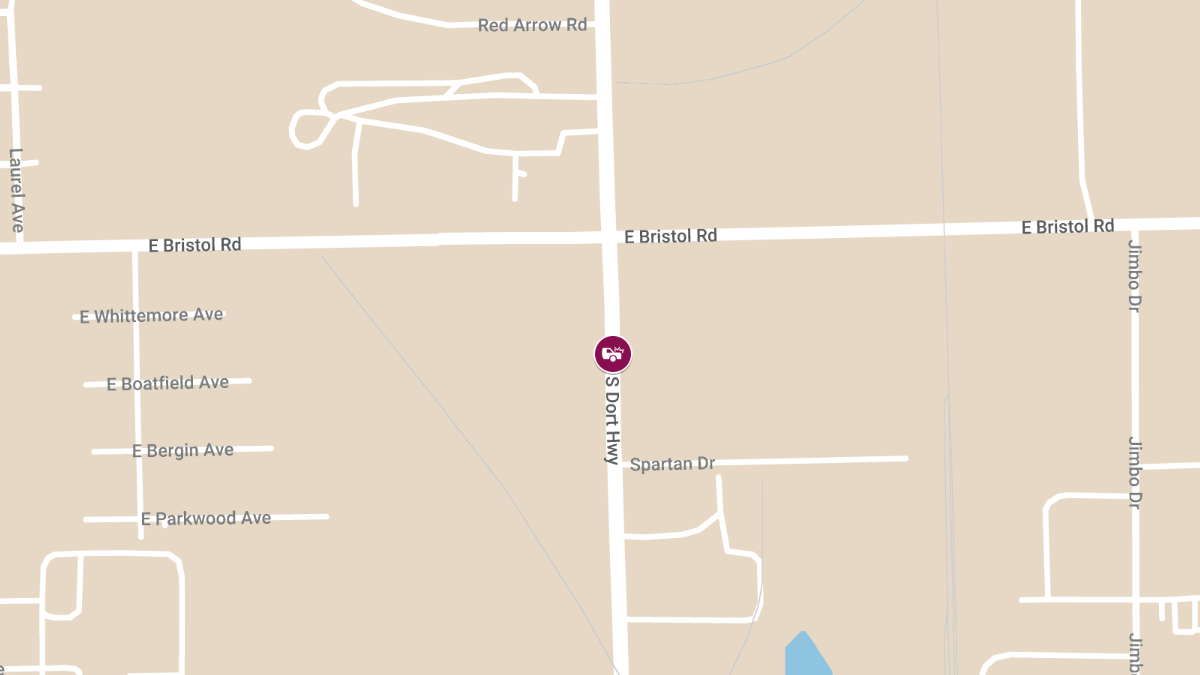 Injury Vehicle Accident at 4101 N Dort Hwy at Big D Party Store