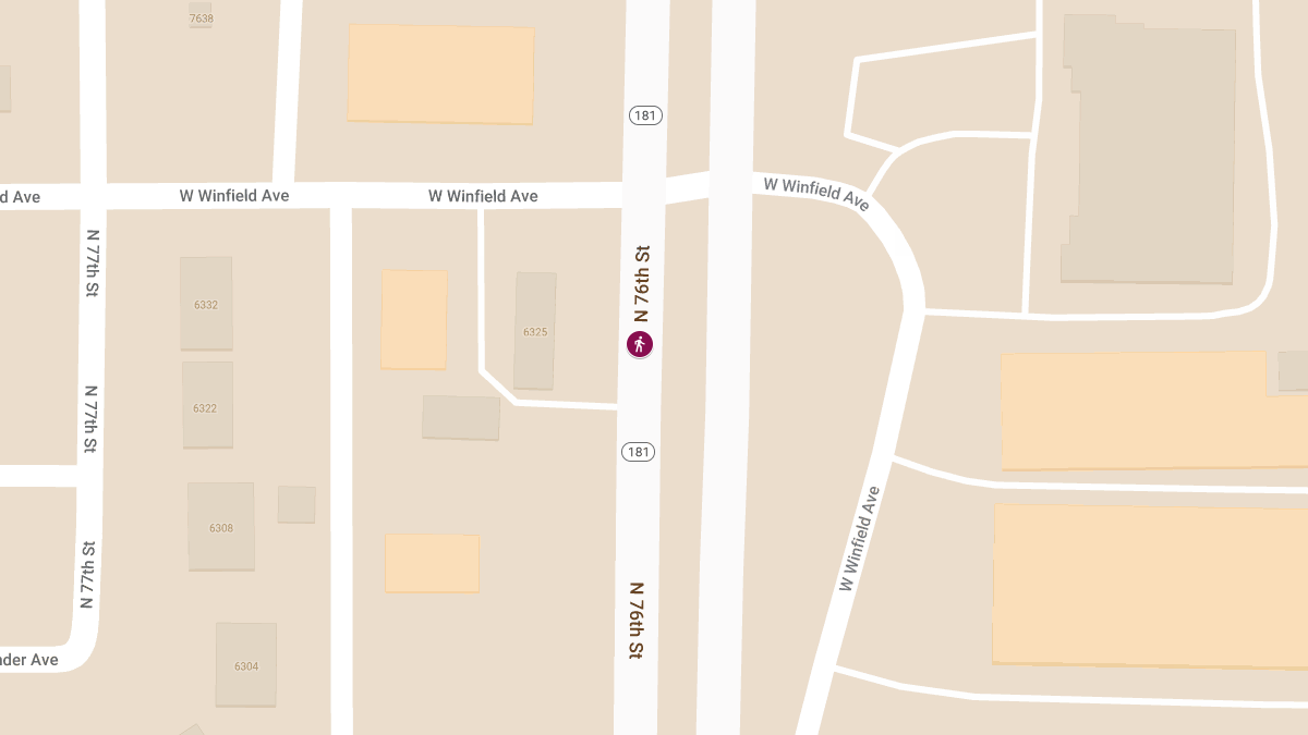 Pedestrian Struck by Vehicle on N 76th St Causes Injuries