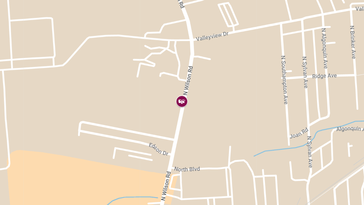 Vehicle Collision with Injuries Reported at Taco Bell on N Wilson Rd