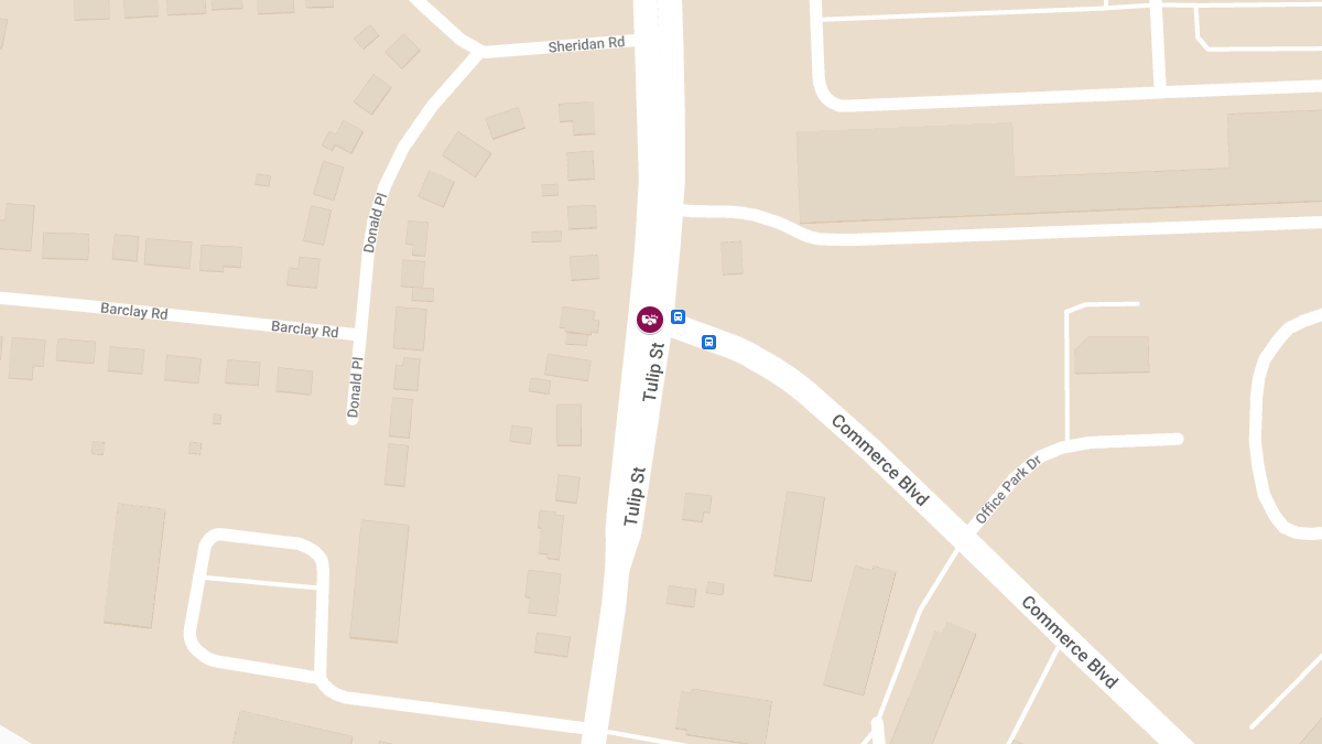 Vehicle Collision with Injuries on Tulip St at Commerce Blvd