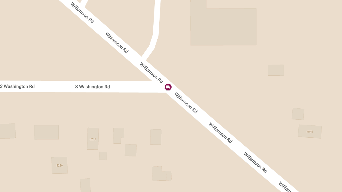 Vehicle Trapped Between Semi and Car at Williamson St & Washington St