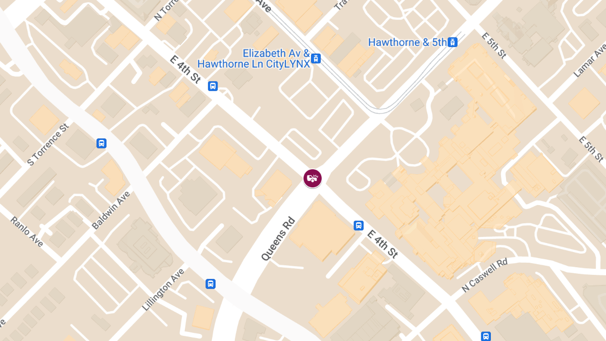 Car Accident at E 4th St & Queens Rd Causes Injuries