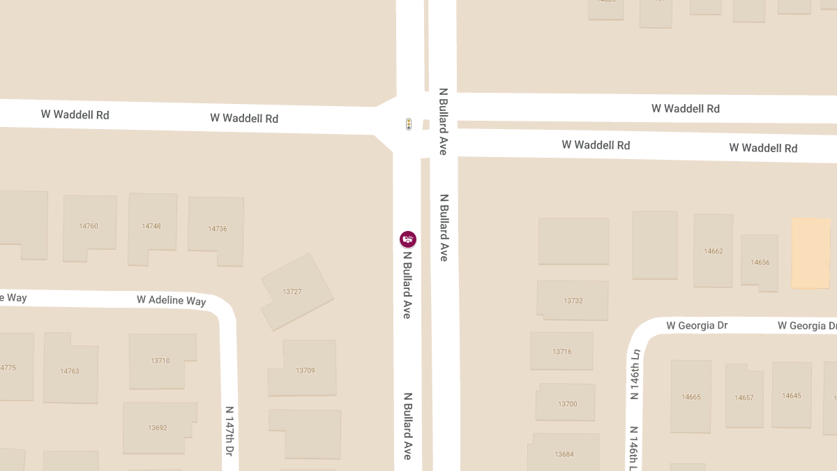 Injury Crash on N Bullard Ave Near W Waddell Rd
