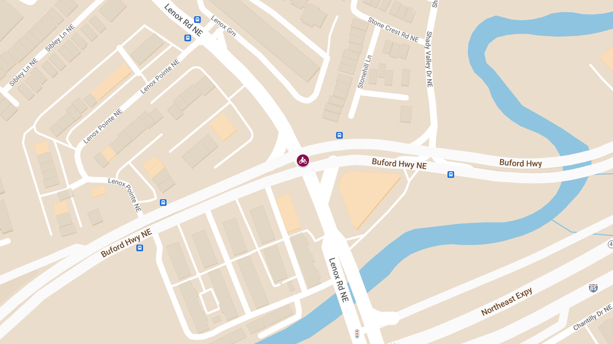 Motorcycle Crash at Lenox Rd NE & Buford Hwy NE Causes Injuries