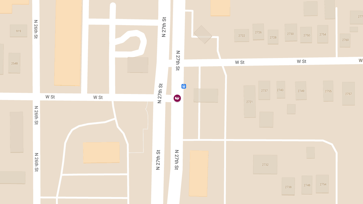 Police Officer and Driver Injured in T-Bone Crash at N 27th St & W St