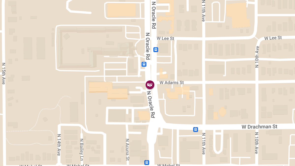 Rollover Crash Involving Bus with Injuries at 1501 N Oracle Rd