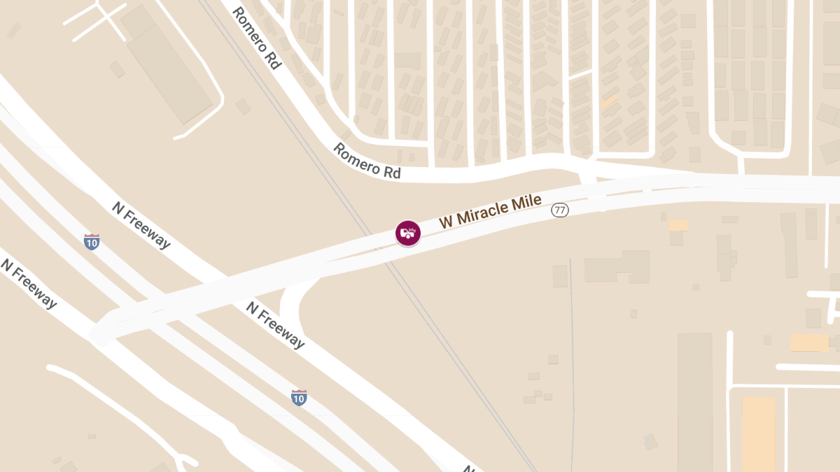 Vehicle Collision With Injuries at 1644 N Miracle Mile