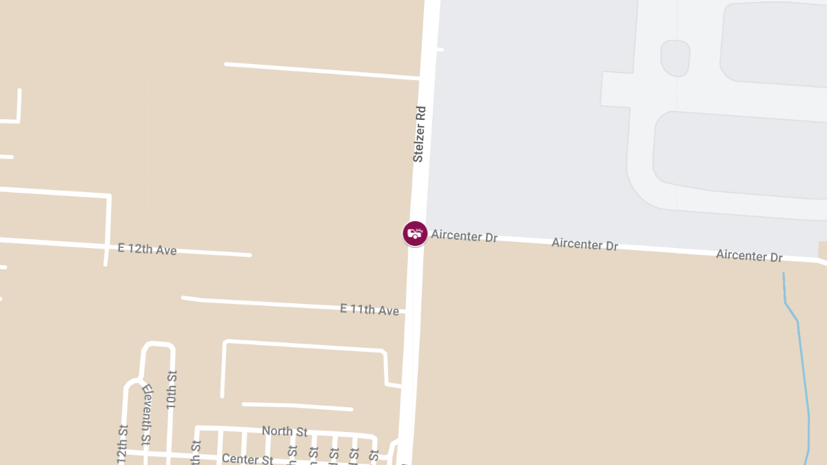 Vehicle Collision with Injuries at Stelzer Rd and Aircenter Dr