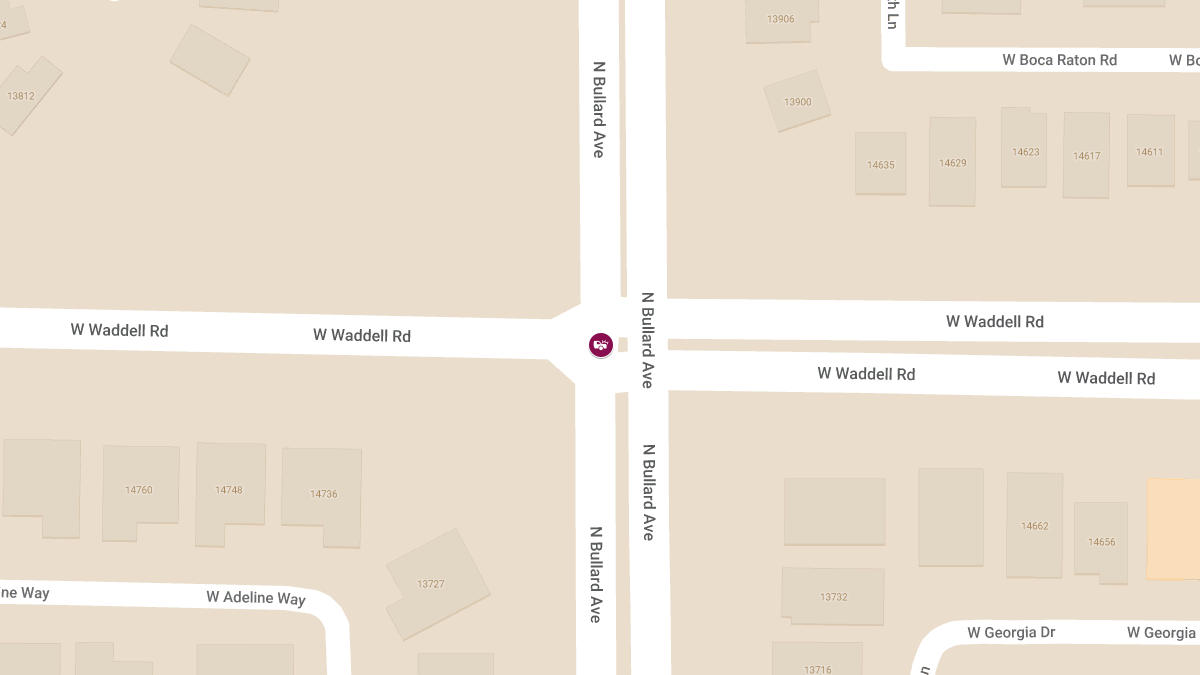 Accident Causes Injury at N Bullard Ave & W Waddell Rd