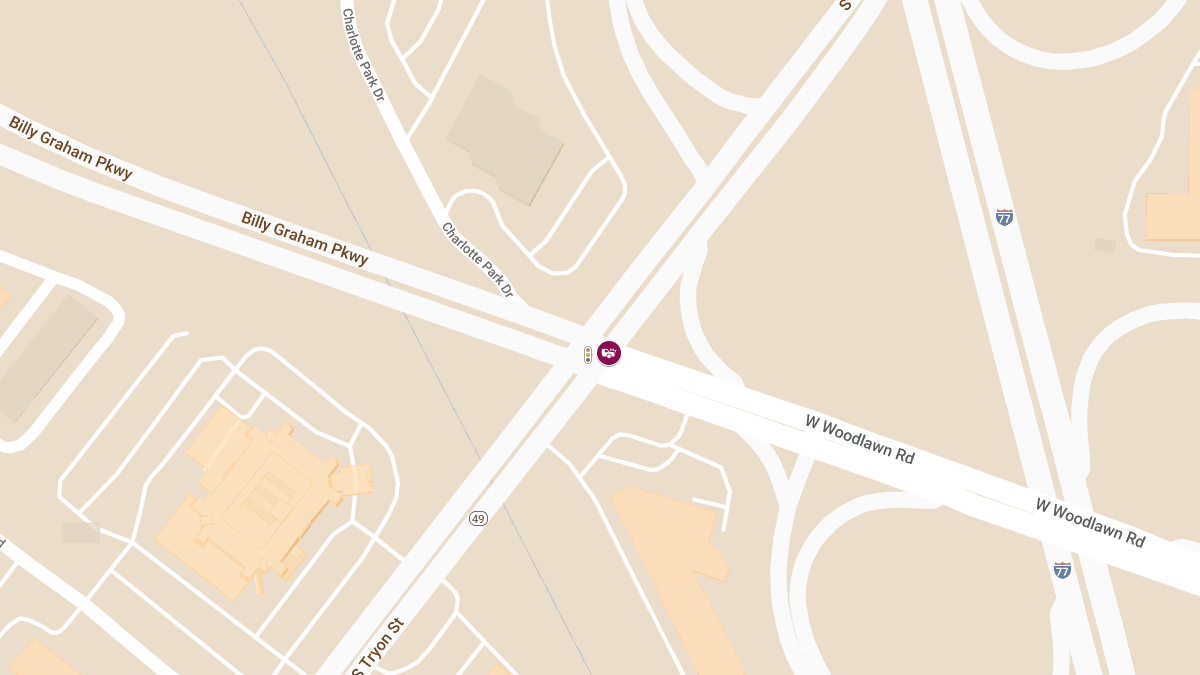Car Crash With Injuries at S Tryon St & W Woodlawn Rd