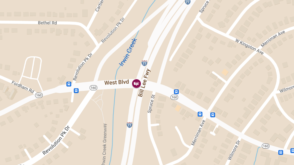 Car Crash with Injuries at West Blvd & Spruce St