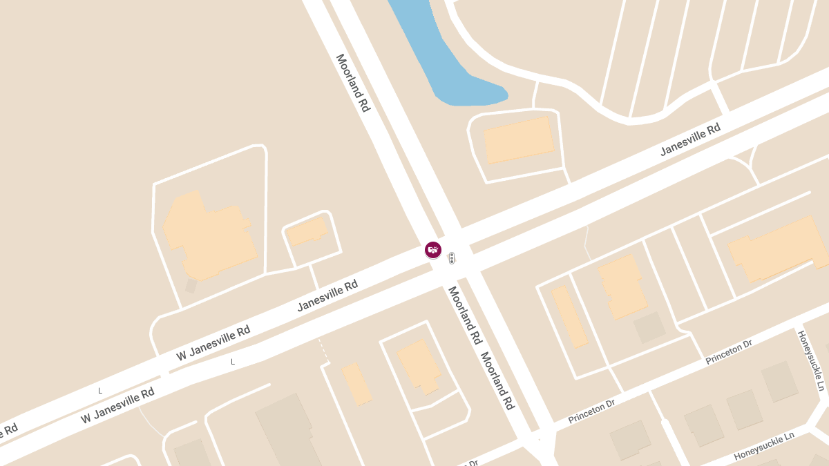 Injuries Reported in Two-Vehicle Rollover Crash at S Moorland Rd & Janesville Rd