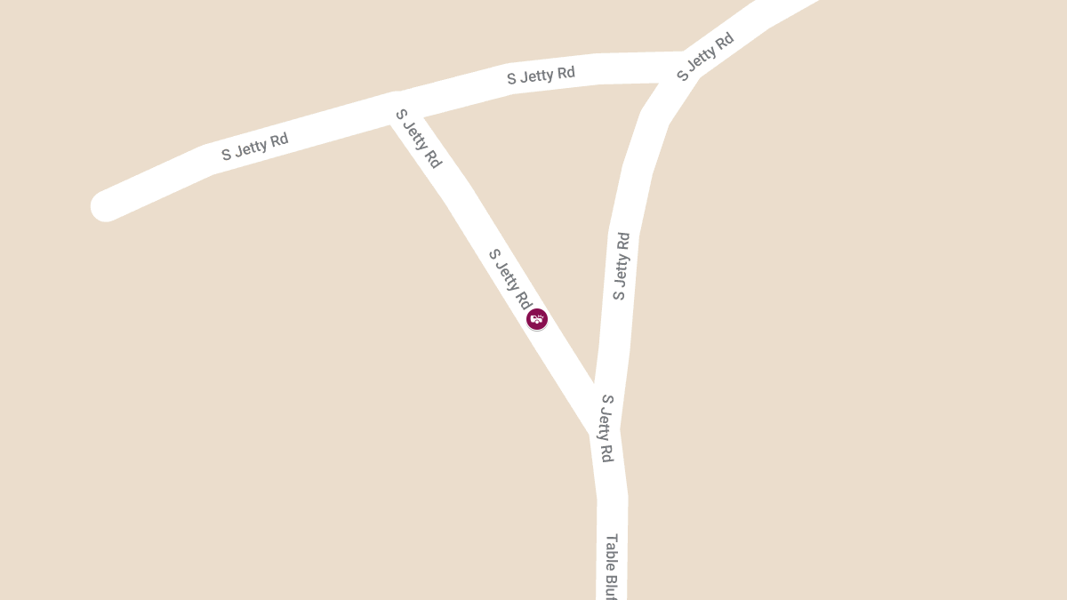 Major Injuries Reported After Vehicle Plunges Down Cliff on South Jetty Rd