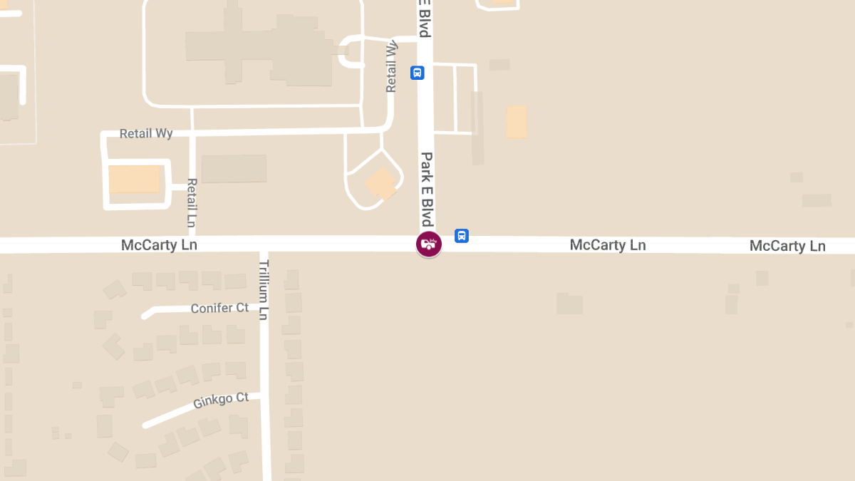 Motorcycle vs. Truck Crash with Injuries at McCarty Ln & Park East Blvd