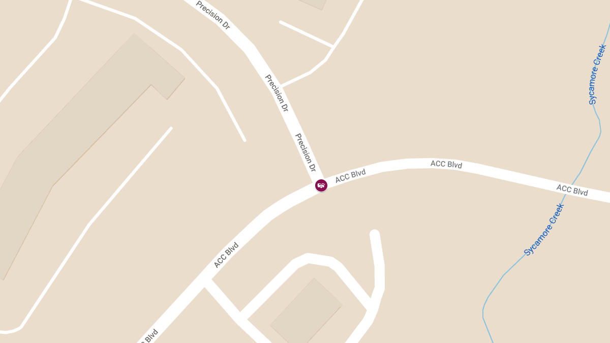 Vehicle Crash With Injuries at Acc Blvd and Precision Dr