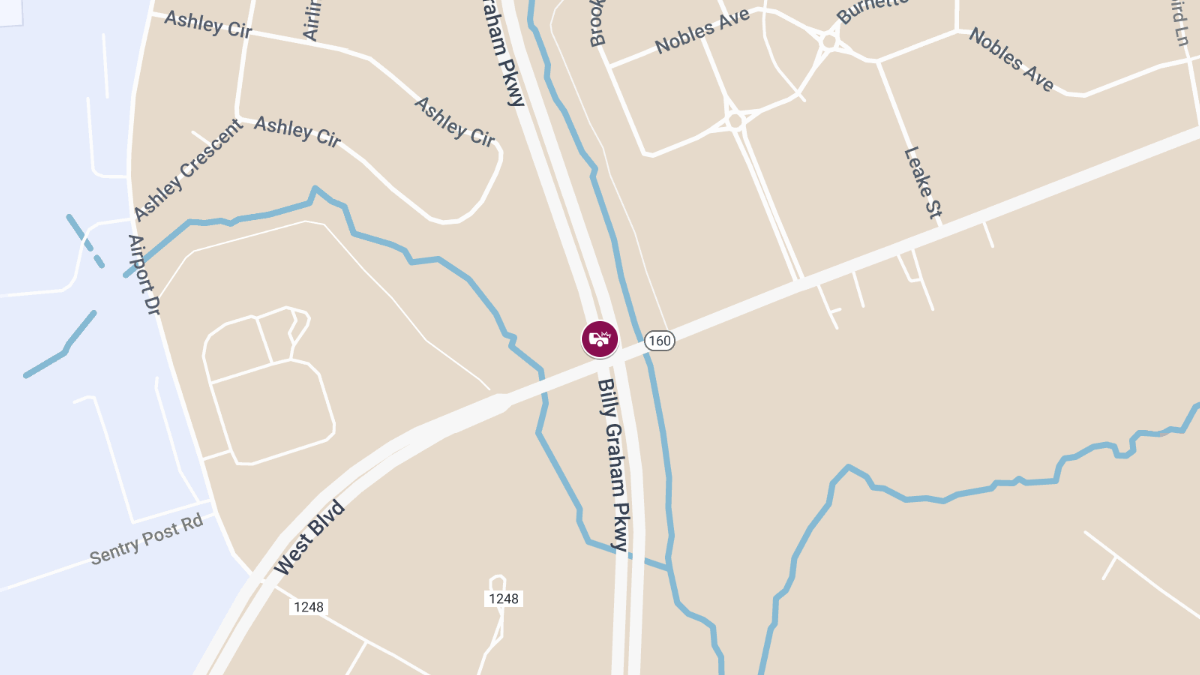 Accident with Injuries at Billy Graham Pkwy & W Tyvola Rd