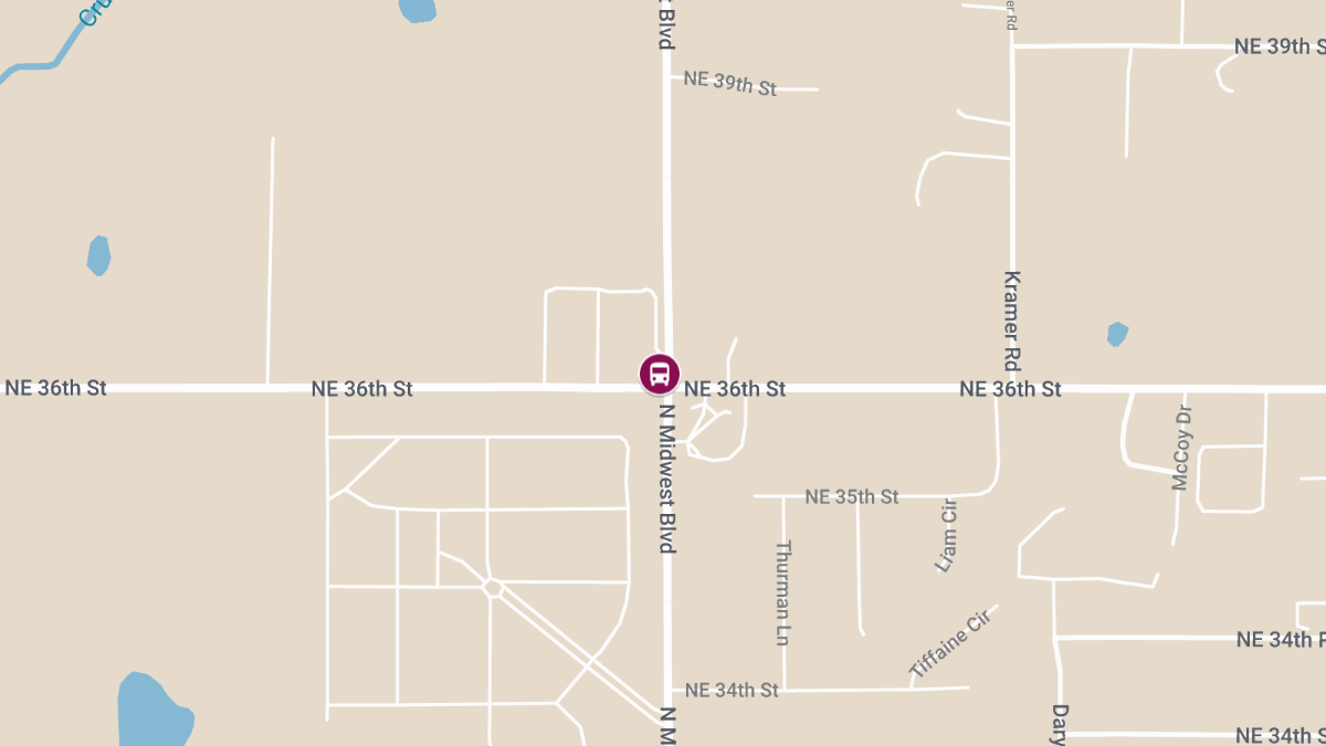 Car and School Bus Collision on N Midwest Blvd & NE 36th St Injures One