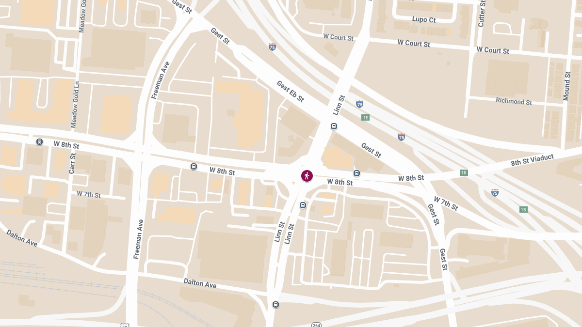 Child Struck by Blue Cadillac at W 8th St & Linn St