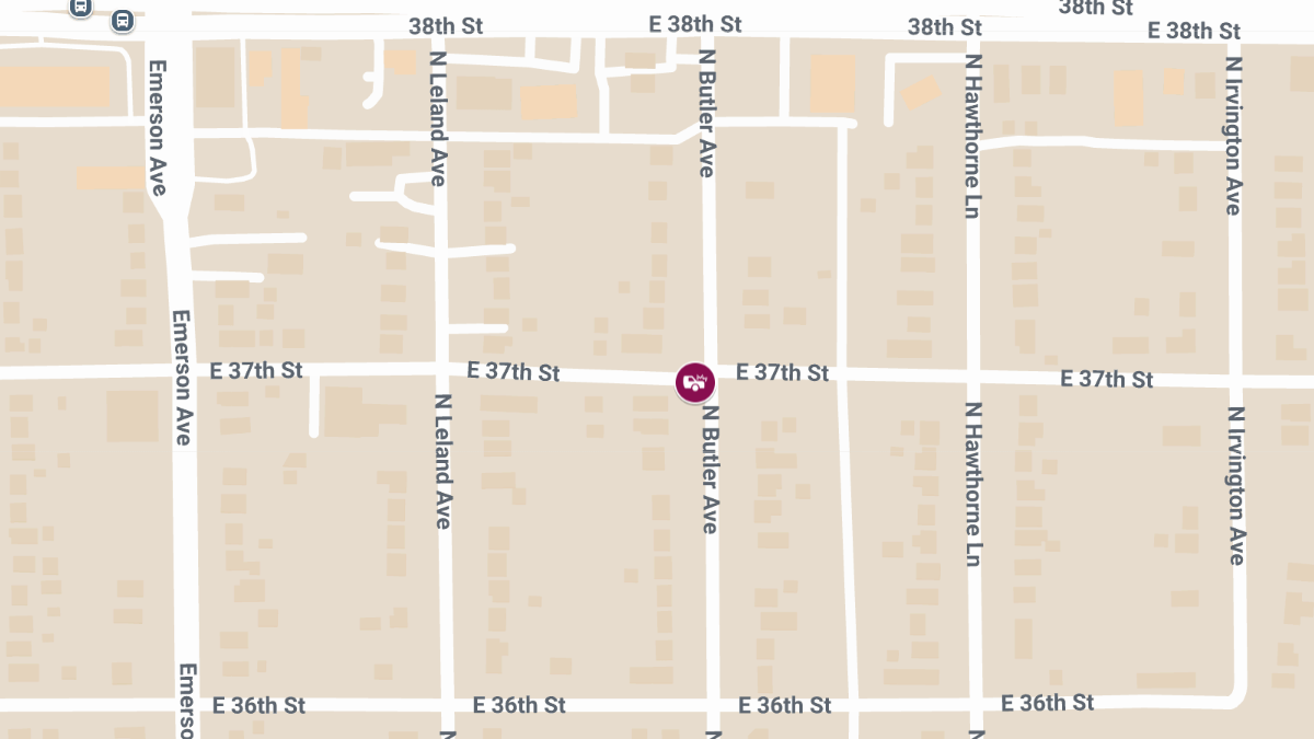 Orange Dodge Charger and White Buick Verano Involved in Crash With Injuries at E 37th St & N Butler Ave